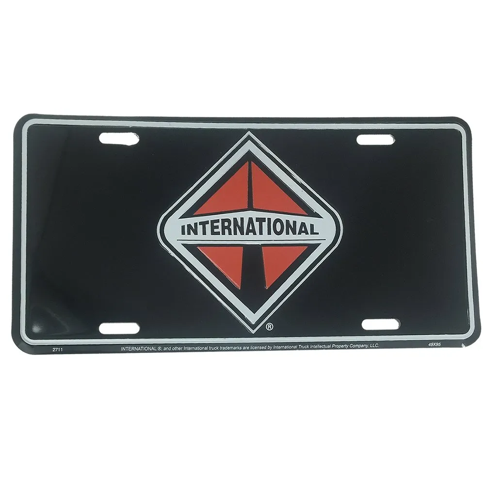 International Black Background License Plate - Embossed Detail, Four Mounting Slots, USA Made